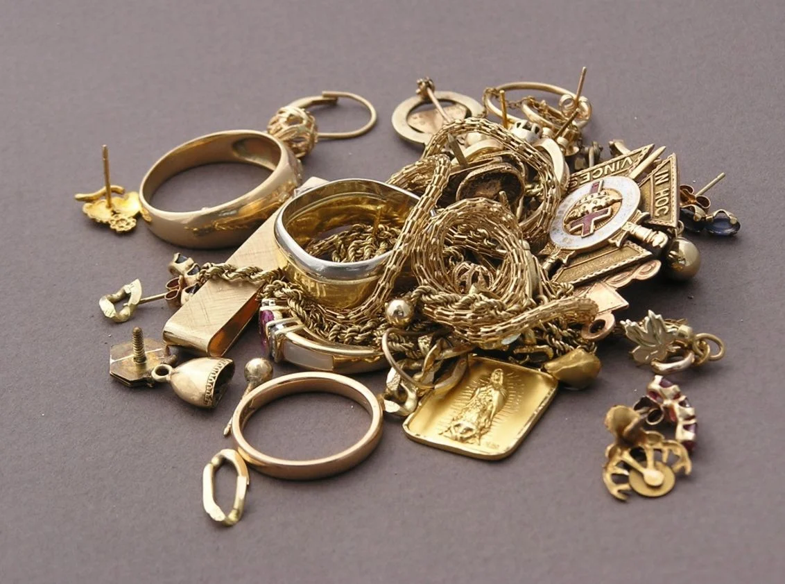 Scrap gold jewelry, rings, chains, and charms